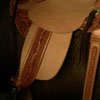 Wade tree, 15 inch seat, Gullet - 7 and 1/2 inch by 6 and 1/4 inch by 4 inch, Horn 4&1/2 inch round, 90 degree bars, 7/8ths full in-skirt riggin, Cheyenne Roll, Buckaroo outside leathers, half-breed Wade Saddle built and tooled with original floral and border design by Keith Valley.